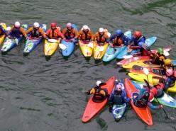 A group of students in kayaks